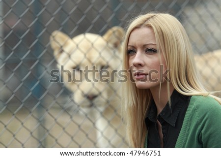 Woman and lion - two cats