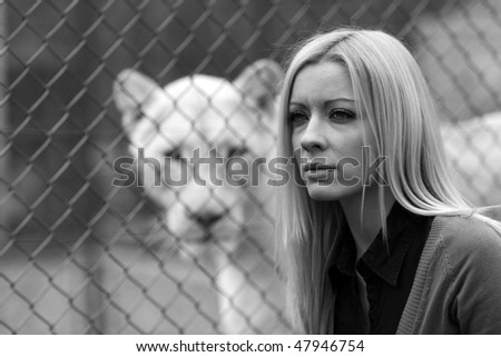 Woman and lion - two cats
