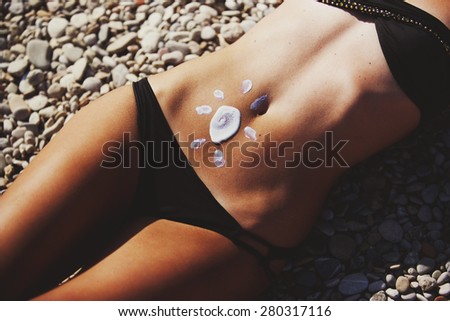 Sun tanned female body