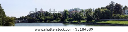 Wide panoramic view of the Po river in Turin
