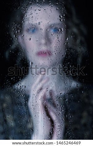 Similar – Image, Stock Photo Woman behind window in building near trees