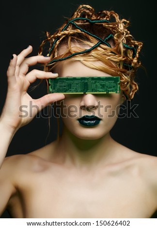 portrait of beautiful young woman with creative hairdo closing her eyes with ram memory