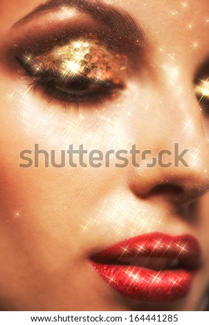 Soft focus portrait of beautiful young woman with shining face makeup