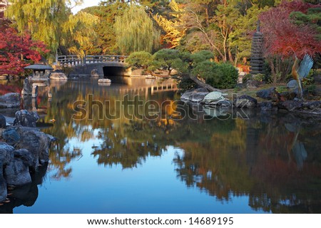 Autumn japanese landscape with pond and trees