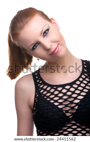 portrait of beautiful redhead pale skinned model posing in black net top