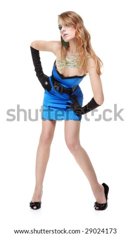 portrait of beautiful girl with bodyart of algae posing in blue dress with wide black belt and black gloves