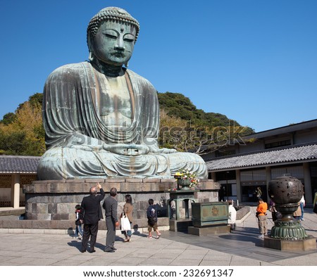 KAMAKURA, JAPAN - NOVEMBER 14, 2007:  Daibutsu - famous Great Buddha bronze statue in Kamakura, Kotokuin Temple.  The second largest bronze Buddha statue in Japan