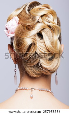 Young blonde woman head from back side