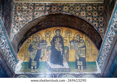 ISTANBUL, TURKEY - JULY 9, 2014: The mosaics in the interior of Hagia Sophia: Virgin with Child flanked by Justinian I and Constantine I, Istanbul, Turkey