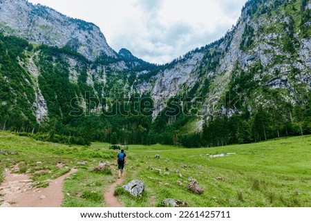 Similar – Image, Stock Photo Man hiking at Königsee