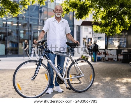 Similar – Image, Stock Photo Cheerful manager with bicycle talking on smartphone