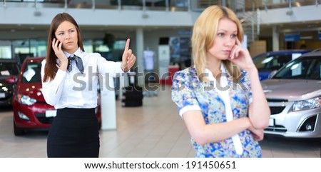 business woman resolving problem of dissatisfied customer woman by phone. Selective focus.