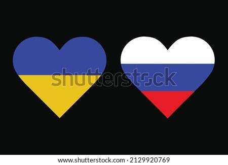 The symbol for the national flags of Ukraine and Russia is in the shape of a heart or love. ukraine flag vs russian flag on black background isolated