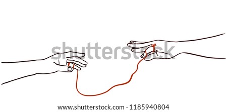 Two hands with red strings attached. concept string of fate.