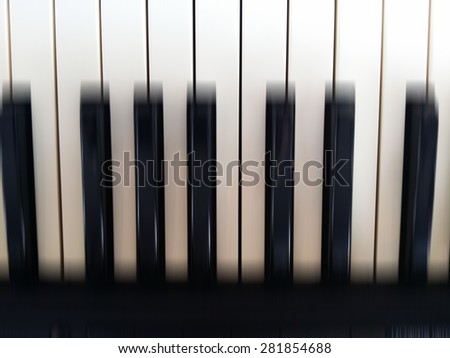 Abstract piano keys blur background
