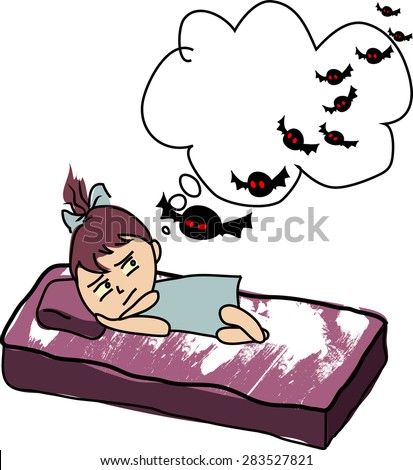 Little girl in bed awaken by nightmares laying scared