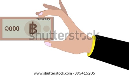 Human hand holding 1000 bath bank note. Bath is the national currency of Thailand