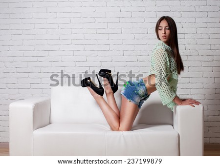 Sexy woman body in jeans shorts