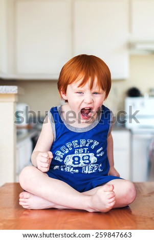 Young boy playing at home in Reno, Nevada, USA