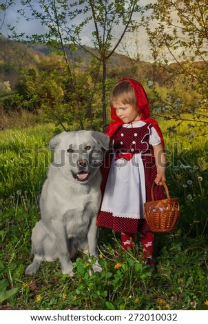Little girl with a wolf . The fairy tale \