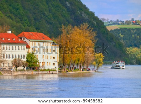A boat cruising on Danube river between Vienna and Passau in Germany