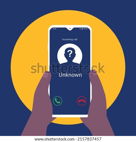 Hand holding a smartphone with unknown incoming call 