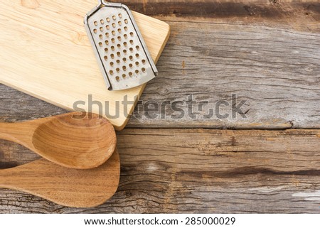 Kitchen tools on wooden background. Top view.
