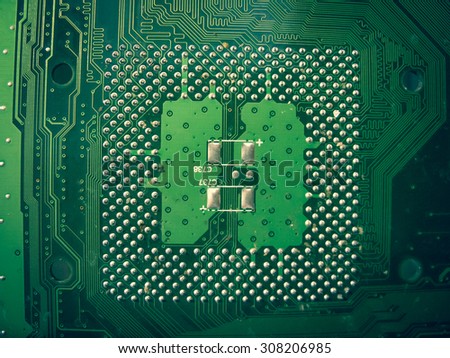 Electronic circuit board soldered on a green PCB