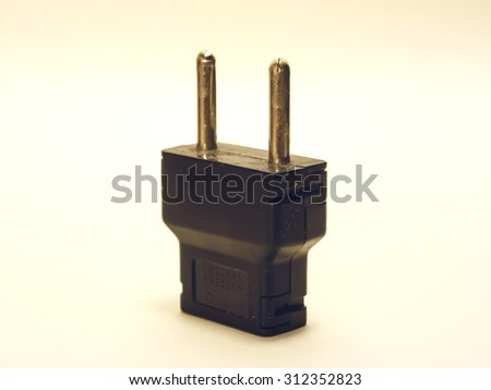 Black Euro plug adapter to power the appliance