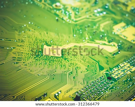 Electronic circuit board with radio components soldered on a green PCB