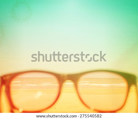 sunglasses on beach in summer old grunge look stained retro image