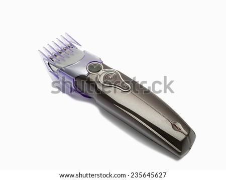 The electric machine for a hairstyle of hair on a white background.