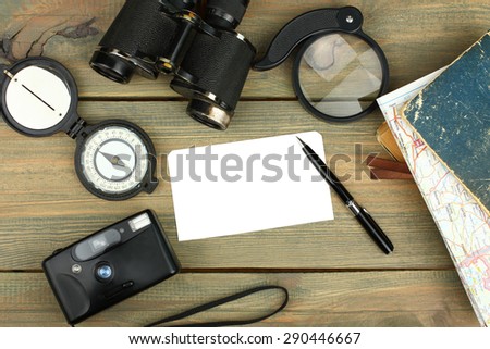 traveling equipment camera binoculars letters and postcard