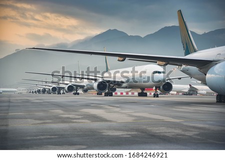 Image, Stock Photo Airliner plane parked at the terminal view from the front cockpit fuselage, on runway at night