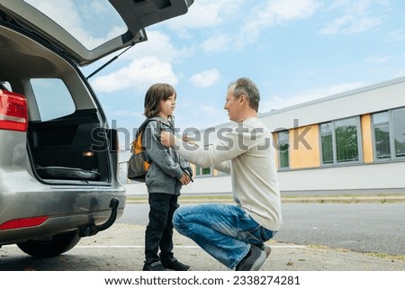Similar – Image, Stock Photo Dad taking care of his little son at home