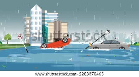 water disaster. flooding houses, submerged vehicles with rising water.