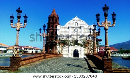 Behold the intricate and beautiful architectural design of restored old church in Las Casas Filipinas de Acuzar.  Imagine de stoc © 