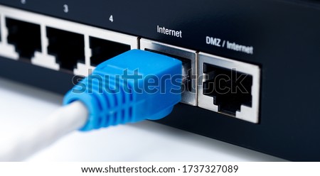 LAN network and internet connection, Ethernet RJ45 cable plug to lan port,modem router. Imagine de stoc © 