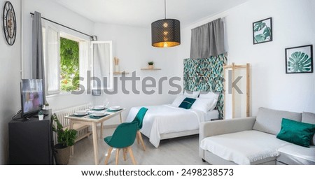 Similar – Image, Stock Photo Bedroom view. Outside it is already bright. Points of light, a curtain reminds of the night