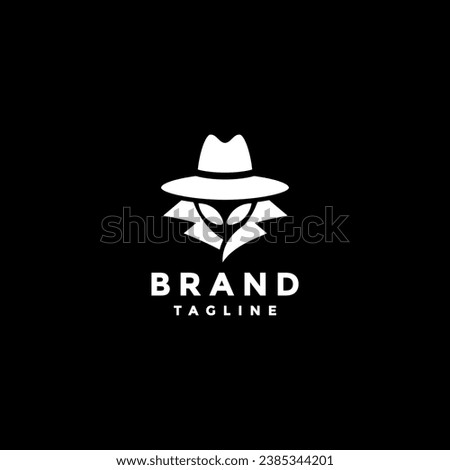 Mysterious Alien In White Logo. Alien Wearing Hat And Coat Logo Design.