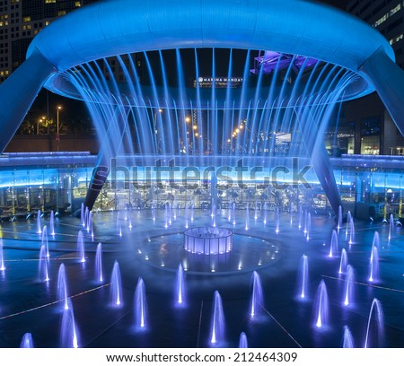 SINGAPORE - JULY 13: Fountain of Wealth, July 13, 2014, Singapore. The Fountain of Wealth is listed by the Guinness Book of Records in 1998 as the largest fountain in the world.