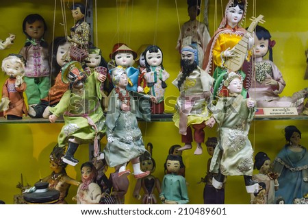 BANGKOK - Group of puppet doll in Bangkok Doll House on August 2 2014, in Bangkok thailand. Since 1957, Bangkok Dolls has been creating a variety of exquisite handmade collectible Thai Dolls.