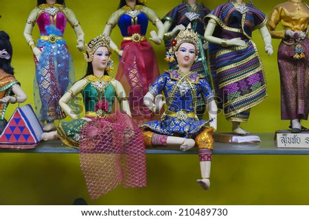BANGKOK - Thai Siam Couple Doll in Bangkok Doll House on August 2 2014, in Bangkok thailand. Since 1957, Bangkok Dolls has been creating a variety of exquisite handmade collectible Thai Dolls.