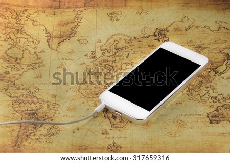 smartphone on a old world map
