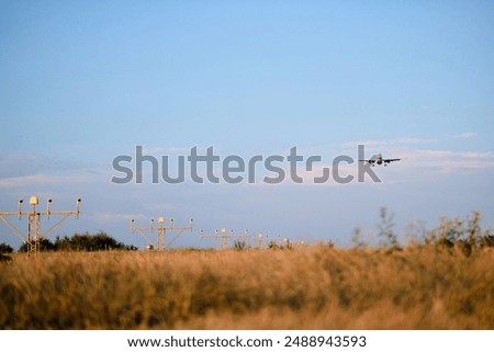 Similar – Image, Stock Photo aircraft approaching for landing