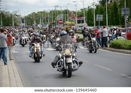WROCLAW, POLAND - MAY 18: Unidentified group rides Harley-Davidson in city center. Around 8 thousands motorcyclist joined international event Super Rally on 18 May 2013 in Wroclaw, Poland.