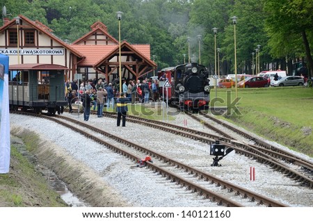 KROSNICE, DOLNY SLASK, POLAND - MAY 25: Restored narrow gauge railroad in Krosnice. Crowded station during opening event on 25 May 2013 in Krosnice, Poland.