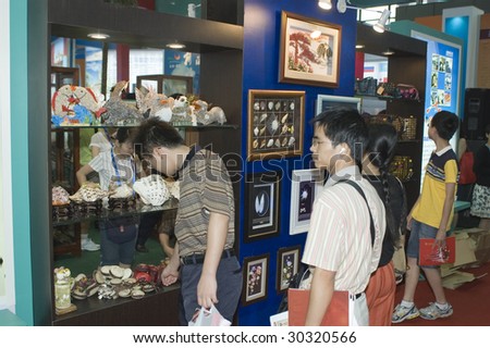 CHINA, GUANGDONG, SHENZHEN - MAY 16, 2009: China Culture Exhibition, showing Chinese art, traditions, folk music, costumes, modern art, opera, different minorities in Guangdong Shenzhen on May 16, 2009.