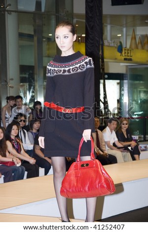 CHINA, SHENZHEN - SEPTEMBER 27: Fashion Week, models promote European brands, September 27, 2009 in Shenzhen, China.