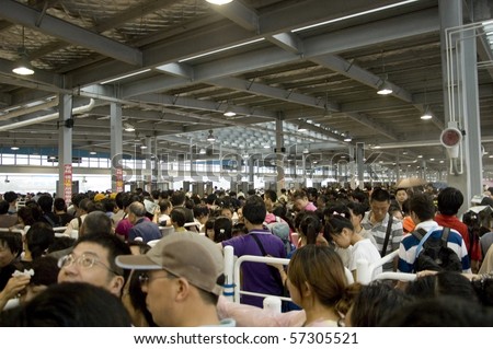 CHINA, SHANGHAI - JUNE 28: Shanghai Expo 2010, Chinese people waiting in long queue to enter Expo on June 28, 2010 in Shenzhen.